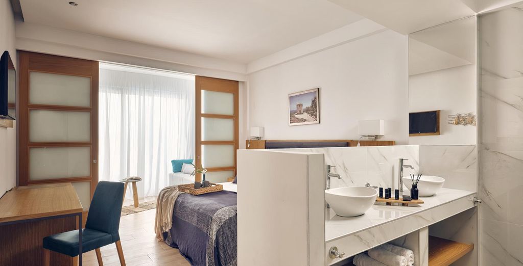 Cavo Orient Beach Hotel & Suites 4*