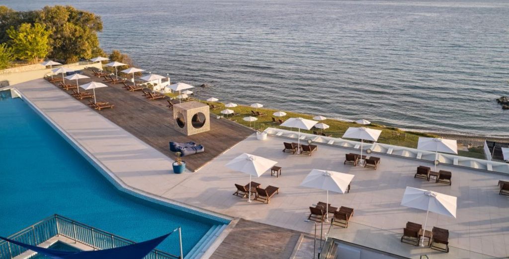 Cavo Orient Beach Hotel & Suites 4*