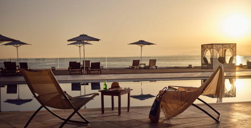 Cavo Orient Beach Hotel & Suites 4*