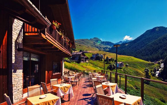 Sapori montani e panorami eccezionali in hotel d'alta gamma